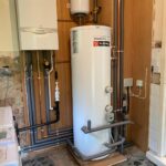 New Boiler in Yorkshire. Complete heating system fitted including Vaillant Ecotec Plus, Gledhill unvented cylinder with remote expansion vessel, system zone valves and wiring. all pipework clipped to plywood back and covered in pipe insulation where appropriate