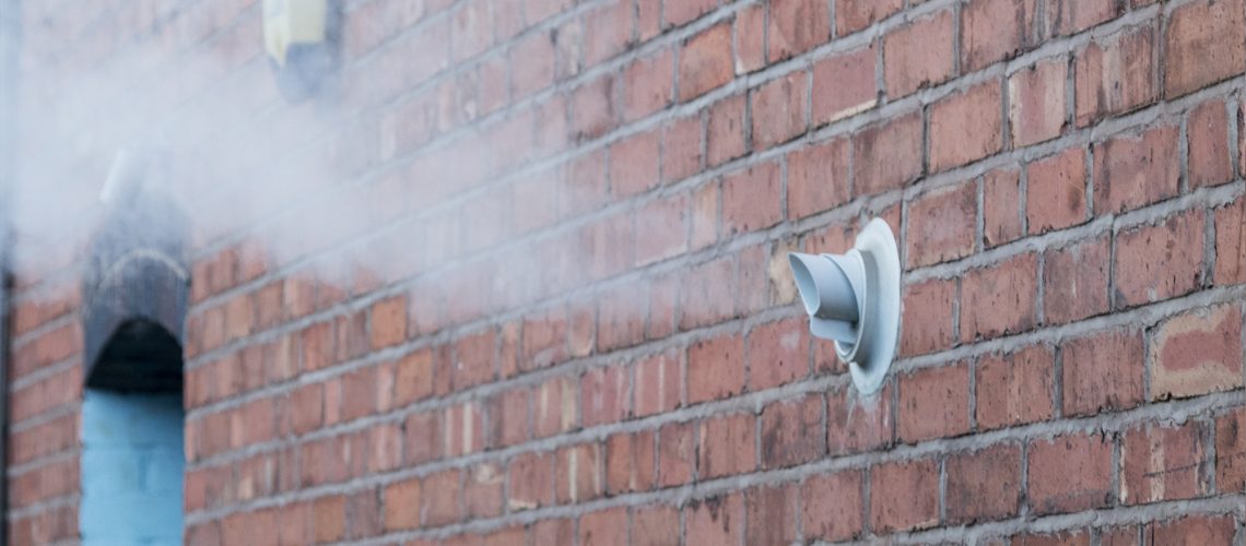 a large plume of water vapour from a boiler flue could look like a boiler on fire