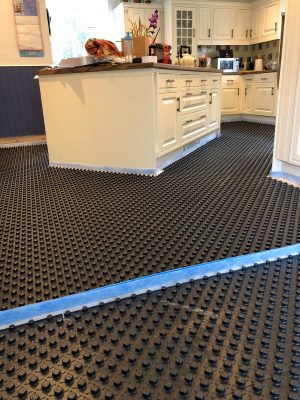 Installation of nu-heat underfloor heating panel matrix