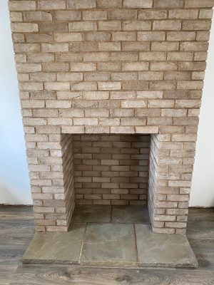 Tile brick-slip chimney breast and builders opening ready for Aspect 8 Slimline SE Woodburning Stove installation