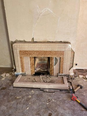 Gas fireplace old fireplace being removed.