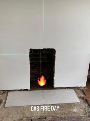 Gas fireplace replacement job laser level precision for new fire surround
