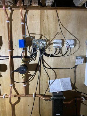 Large heating system wiring centre for 3 pumps, 3 valves, 2 wireless control receivers and boiler.