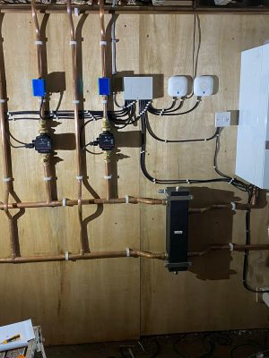 Large heating system using low loss header piped into 3 circuits for heating and hotwater