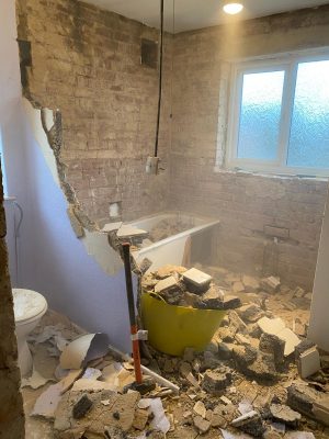 Straight swap bathroom removing partition wall between cloakroom and bathroom to create one large bathroom with large window