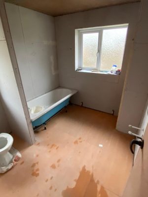 Straight swap bathroom first fix complete with bath and toilet in position
