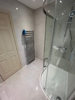 bathroom and ensuite project showing ensuite towel radiator near door