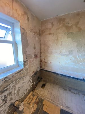 small bathroom renovation bath wall repairs for new tiles. Bath and shower hot and cold pipes capped ready